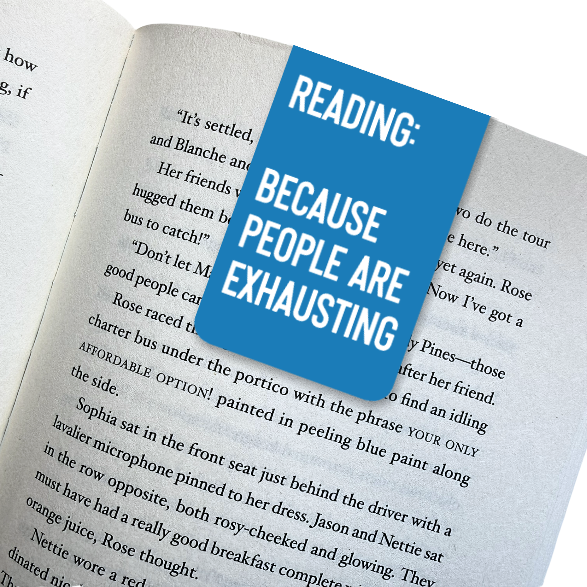 Open book with a blue magnetic bookmark reading 'Reading: Because people are exhausting'.